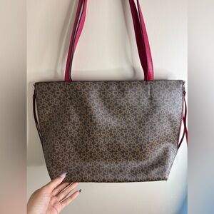 Reversible solid red and brown DKNY print tote bag